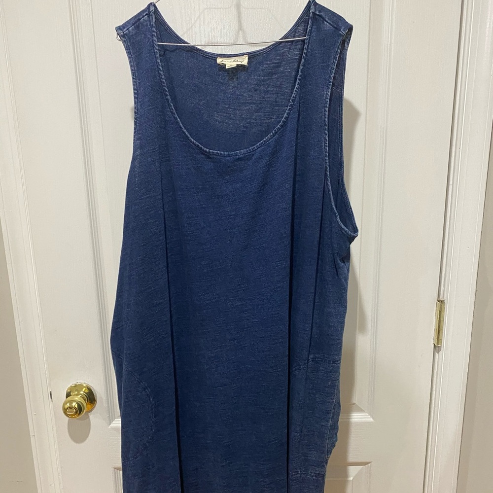 Blue sleeveless dress with a jean look to it